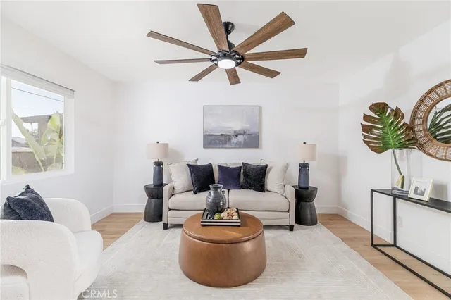 a living room with furniture and a rug