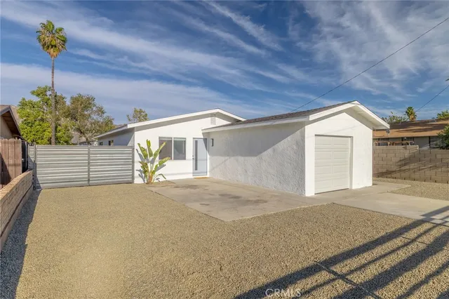 a view of a house with a garage