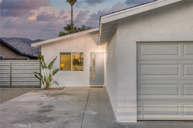 a view of entrance gate of house