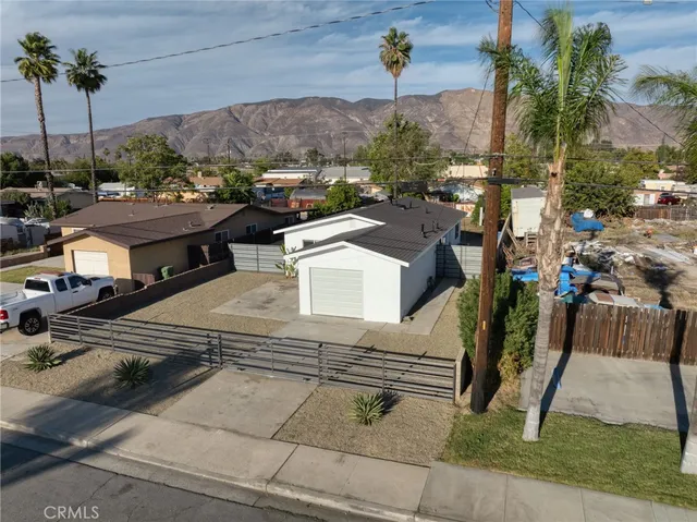 a view of a house with a park