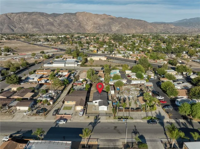 an aerial view of residential house with parking space