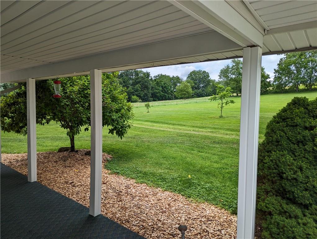 767 Marianna Lone Pine Road Amity, PA 15311 - Photo 11 of 49 a view of a porch with a big yard
