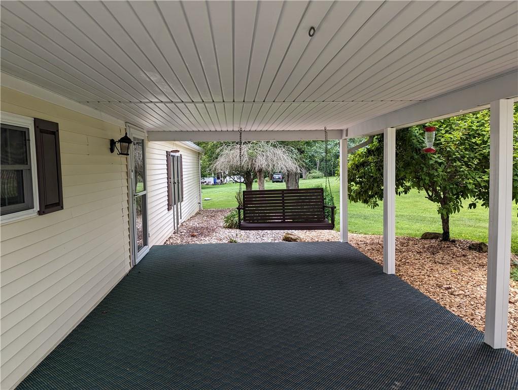 767 Marianna Lone Pine Road Amity, PA 15311 - Photo 12 of 49 a view of a porch with furniture and garden