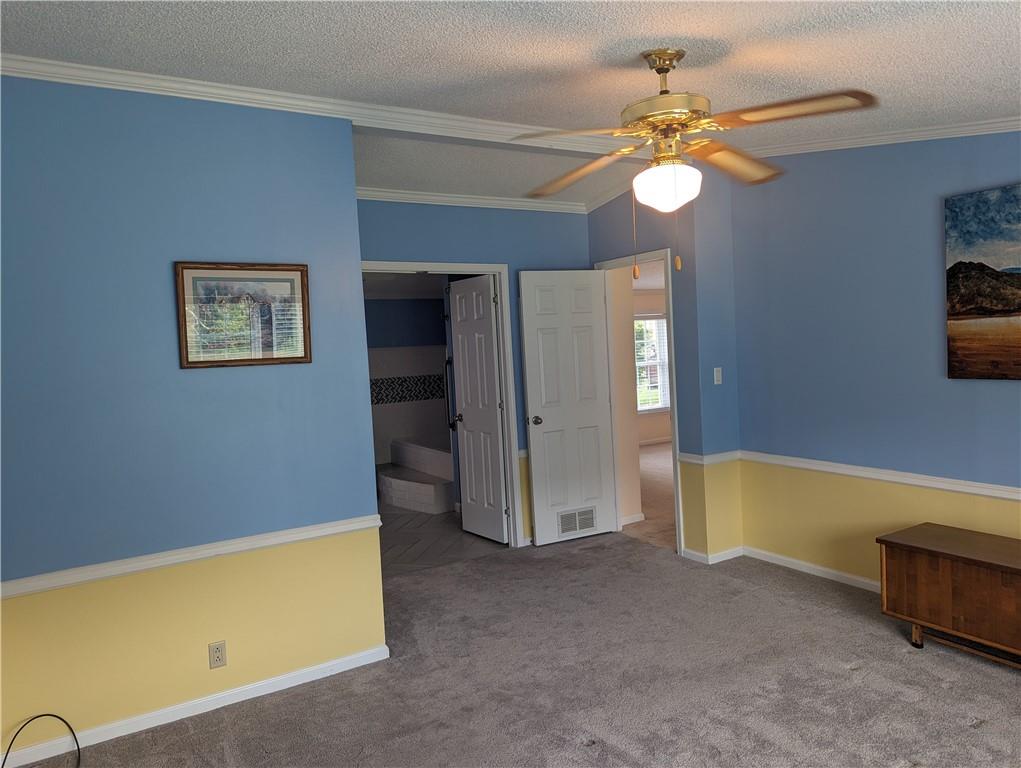 767 Marianna Lone Pine Road Amity, PA 15311 - Photo 14 of 49 a view of an empty room with window and a ceiling fan