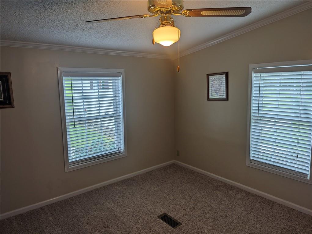 767 Marianna Lone Pine Road Amity, PA 15311 - Photo 15 of 49 an empty room with windows and fan