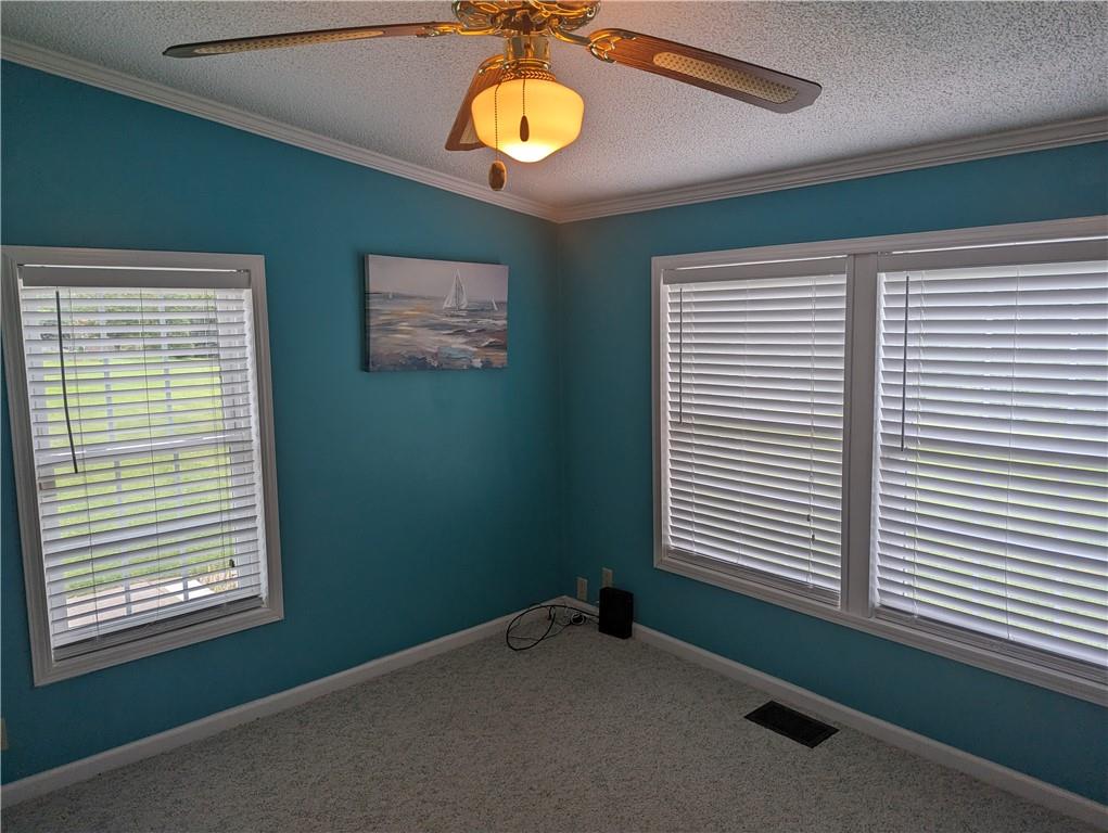 767 Marianna Lone Pine Road Amity, PA 15311 - Photo 16 of 49 a view of a room with a window and a ceiling fan