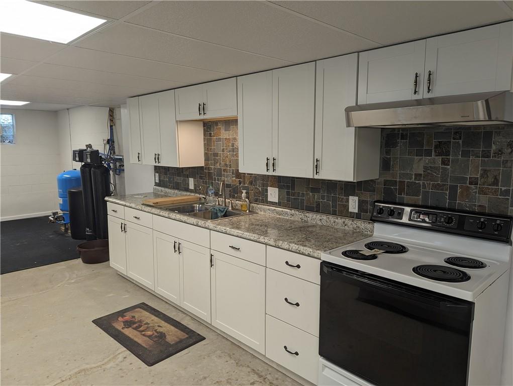 767 Marianna Lone Pine Road Amity, PA 15311 - Photo 35 of 49 a kitchen with granite countertop a sink stove and cabinets