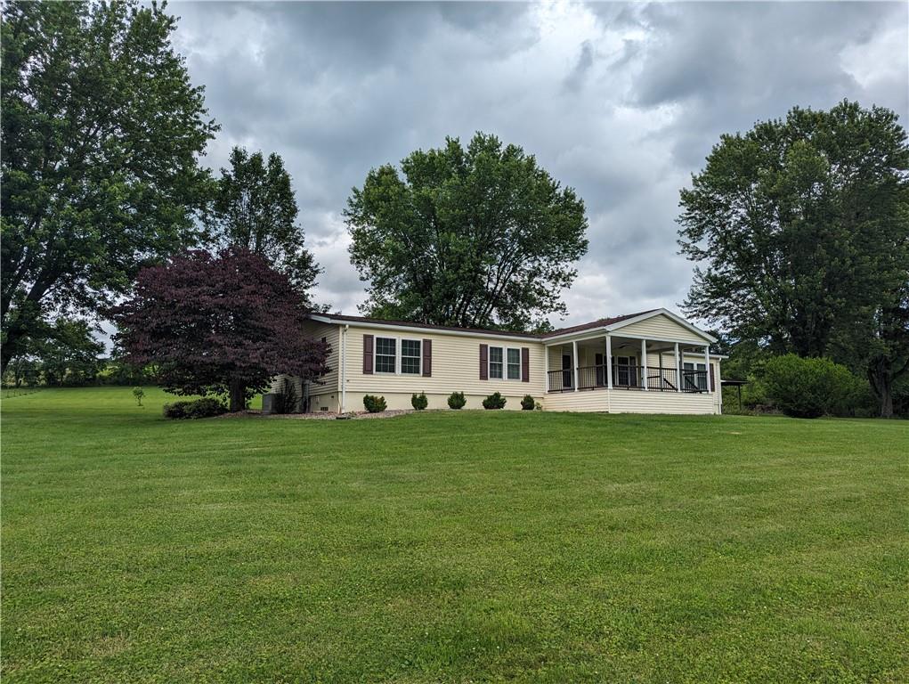 767 Marianna Lone Pine Road Amity, PA 15311 - Photo 6 of 49 a front view of a house with a garden
