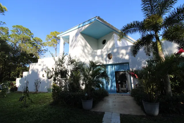 a view of a house with a street
