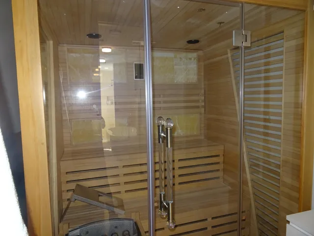 a bedroom with bed and window