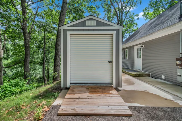 $464,900 | 10911 Woodbrook Drive, Cement City, MI 49233