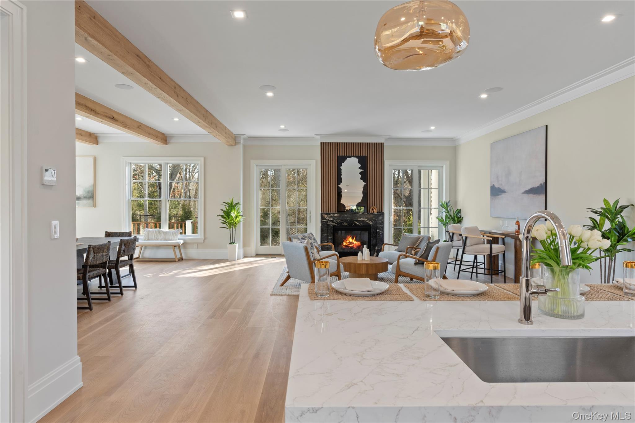 2590 Cox Neck Road Mattituck, NY 11952 - Photo 13 of 50 Designed for both entertaining and everyday living, the kitchen blends refined craftsmanship with top tier appliances and timeless style