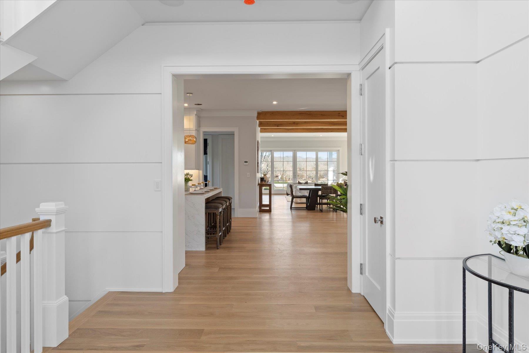 2590 Cox Neck Road Mattituck, NY 11952 - Photo 20 of 50 A grand yet welcoming front entrance sets the tone for the home, introducing refined coastal elegance from the moment you arrive