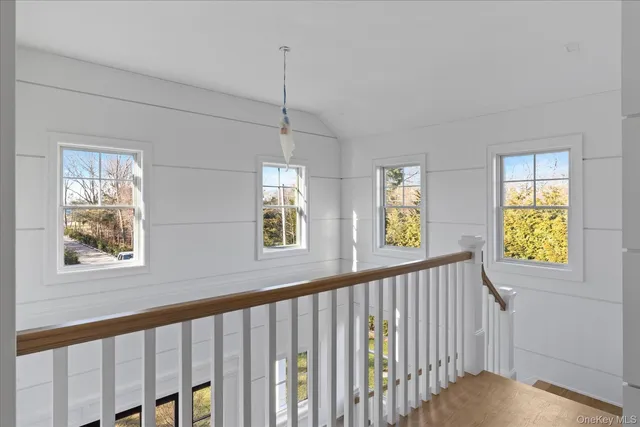 an aerial view of a house with a swimming pool