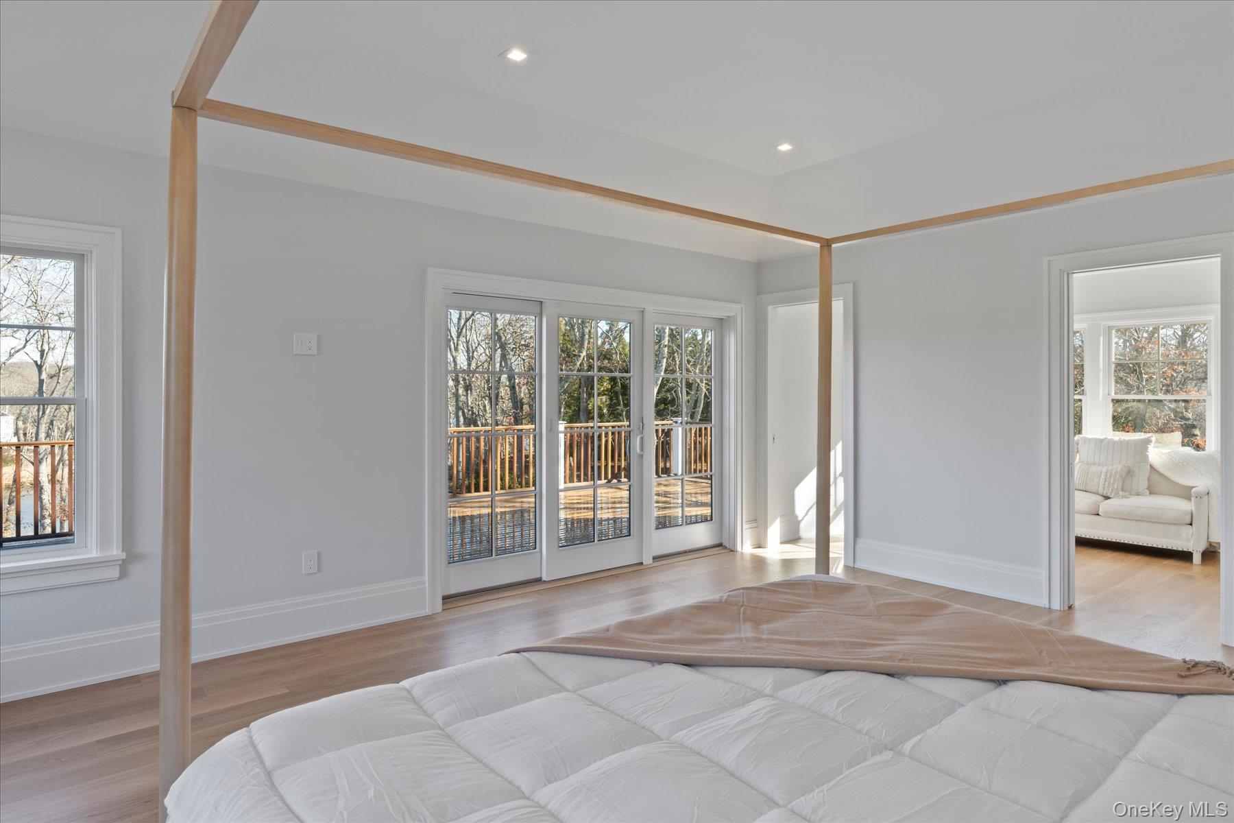 2590 Cox Neck Road Mattituck, NY 11952 - Photo 23 of 50 A luxurious primary ensuite blending refined finishes with spa inspired comfort