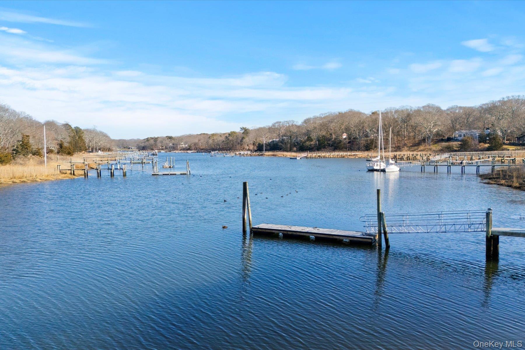 2590 Cox Neck Road Mattituck, NY 11952 - Photo 36 of 50 Private dockage with direct access to Mattituck Inlet, offering the ultimate North Fork boating and waterside lifestyle