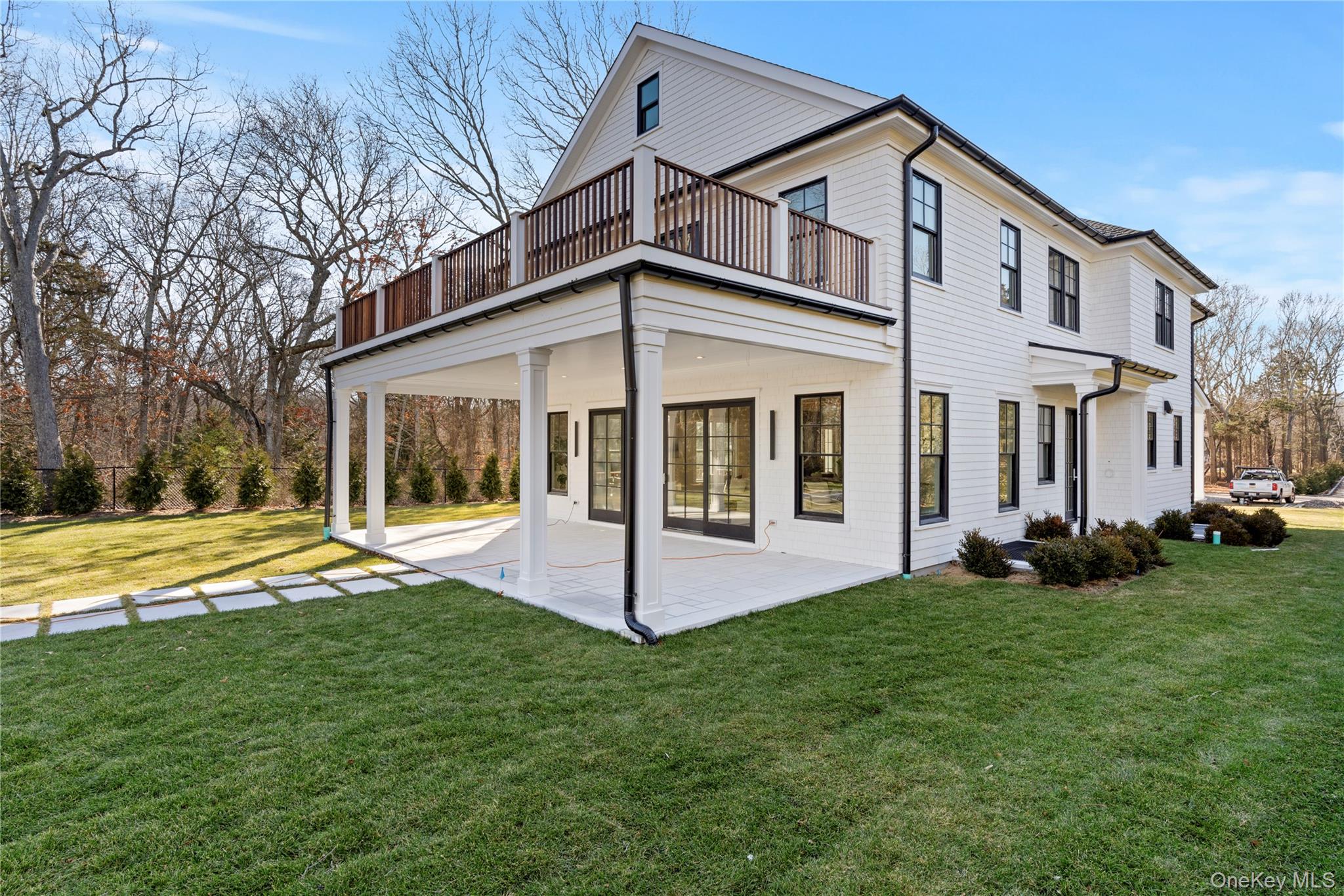 2590 Cox Neck Road Mattituck, NY 11952 - Photo 42 of 50 A covered porch extends the living space outdoors perfect for enjoying the water views and sunsets