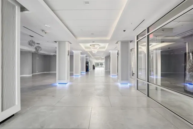 a view of a swimming pool with a lounge chair