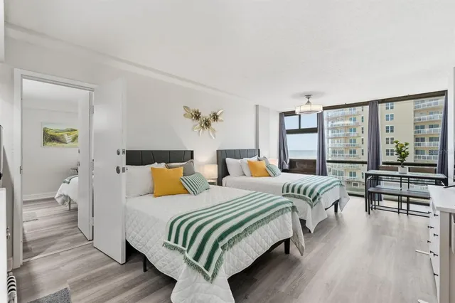 an aerial view of a balcony with chairs