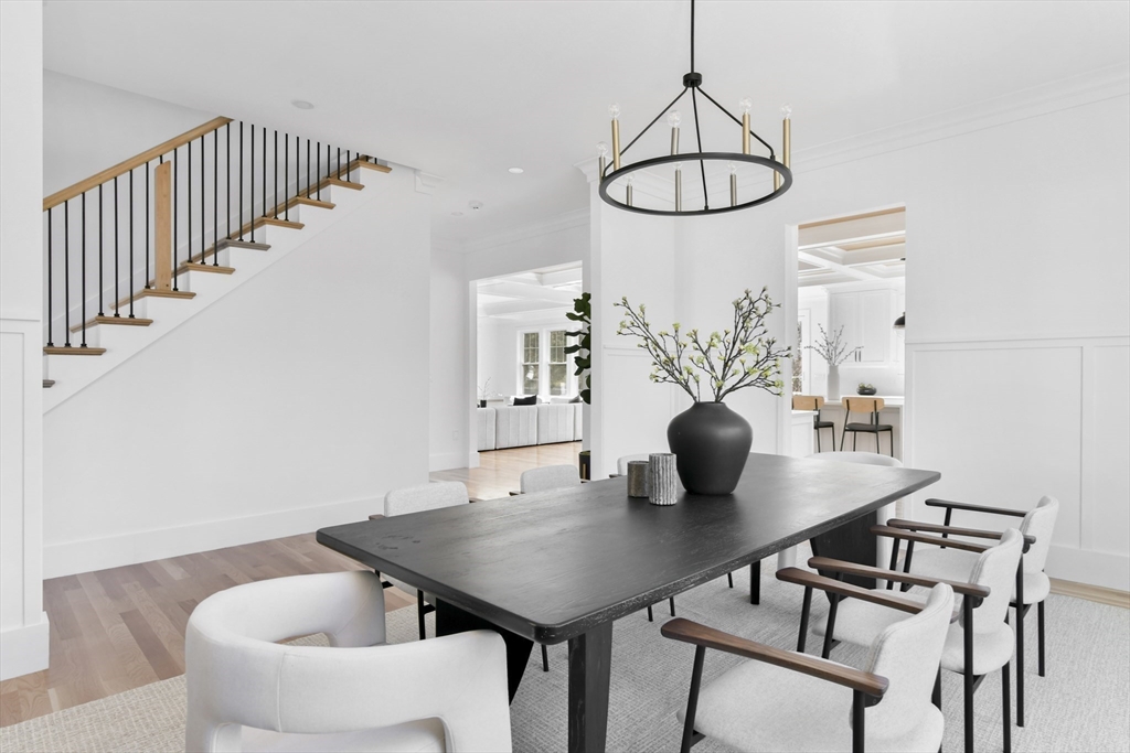 62 Brewster Drive Needham, MA 02492 - Photo 20 of 42 a view of a dining room with furniture and wooden floor
