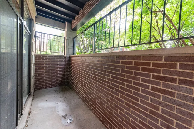 a view of a wooden door and outdoor space