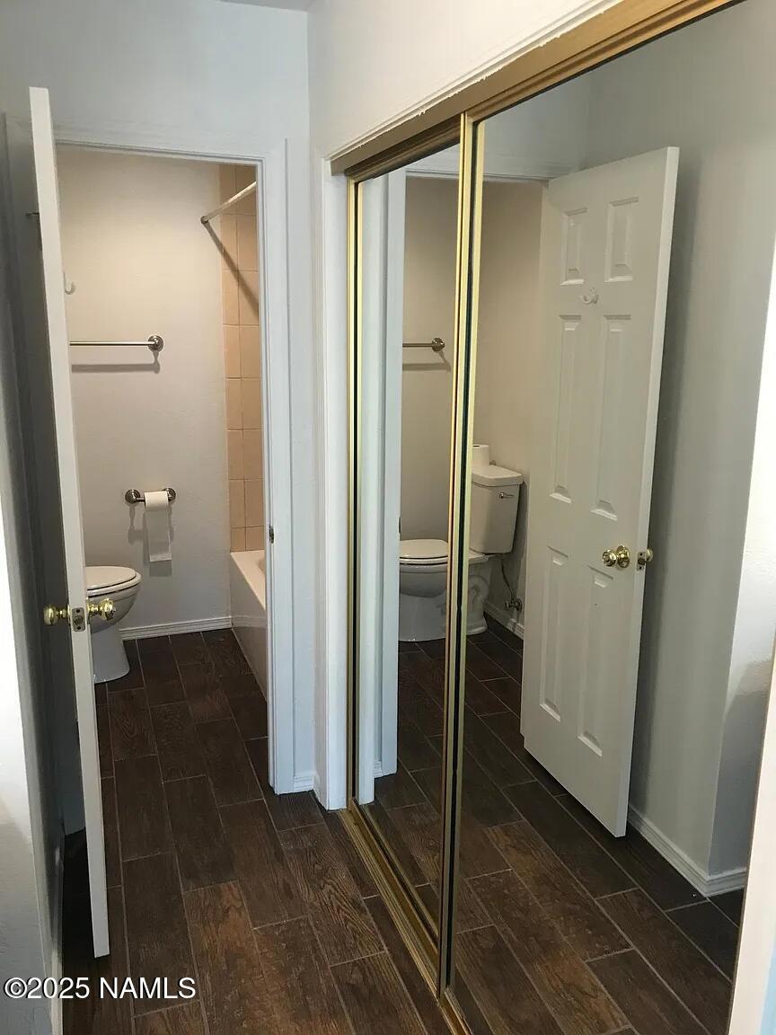 4045 South Lake Mary Road, Unit 5 Flagstaff, AZ 86005 - Photo 8 of 9 a bathroom with a shower and a toilet