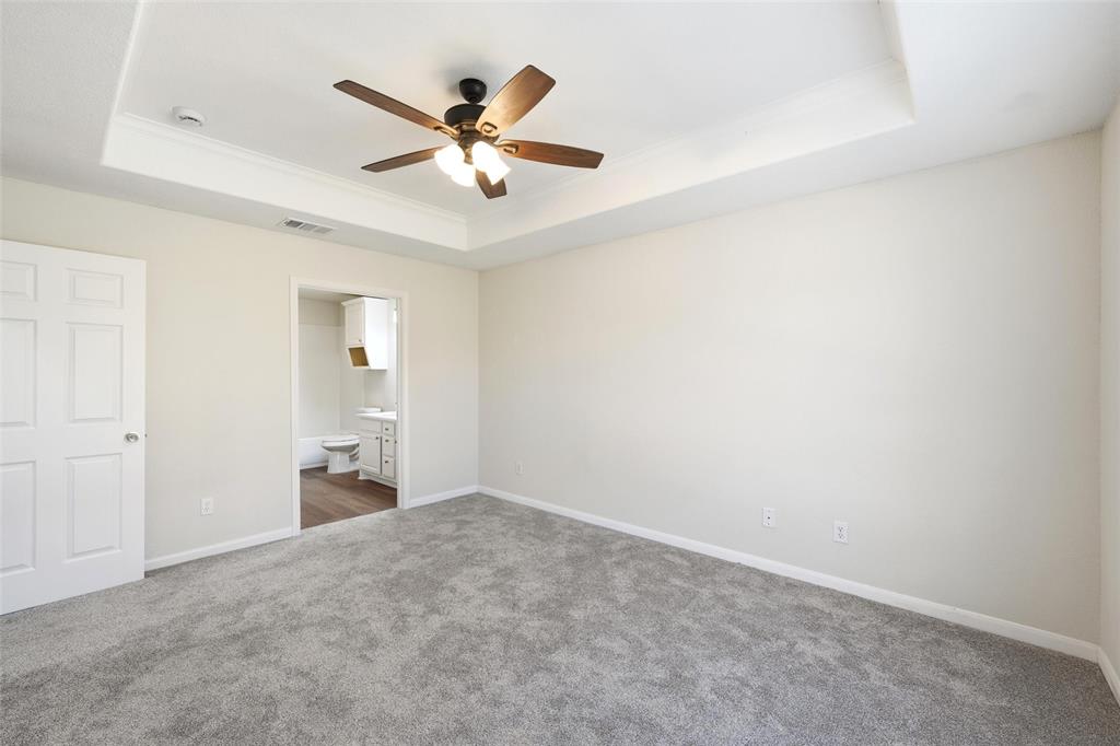 10124 Colony Drive Waco, TX 76708 - Photo 18 of 23 a view of a livingroom with a ceiling fan and wooden floor