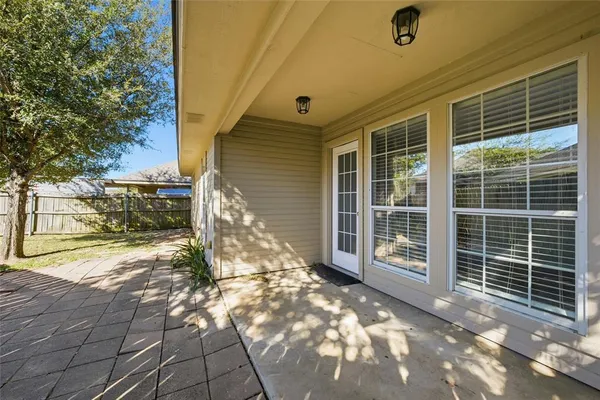 a view of front door and yard