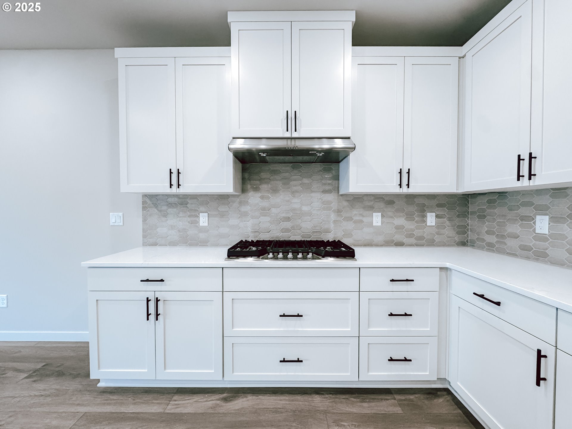 2603 South 6th Way Ridgefield, WA 98642 - Photo 34 of 41 a stove top oven sitting inside of a kitchen