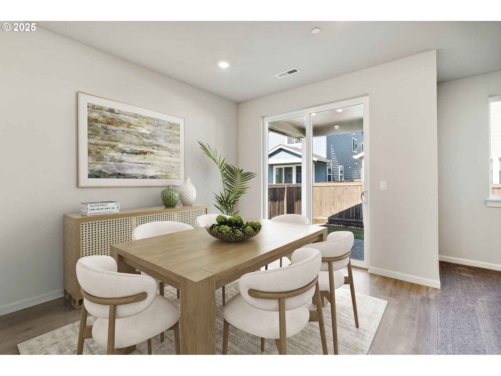 2603 South 6th Way Ridgefield, WA 98642 - Photo 7 of 41 a view of a dining room with furniture and wooden floor