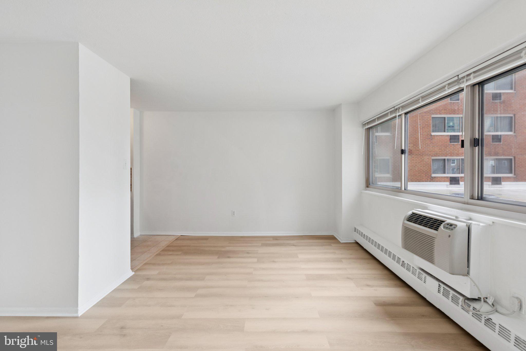 2101 Chestnut Street, Unit 324R Philadelphia, PA 19103 - Photo 2 of 21 a view of an empty room with a window