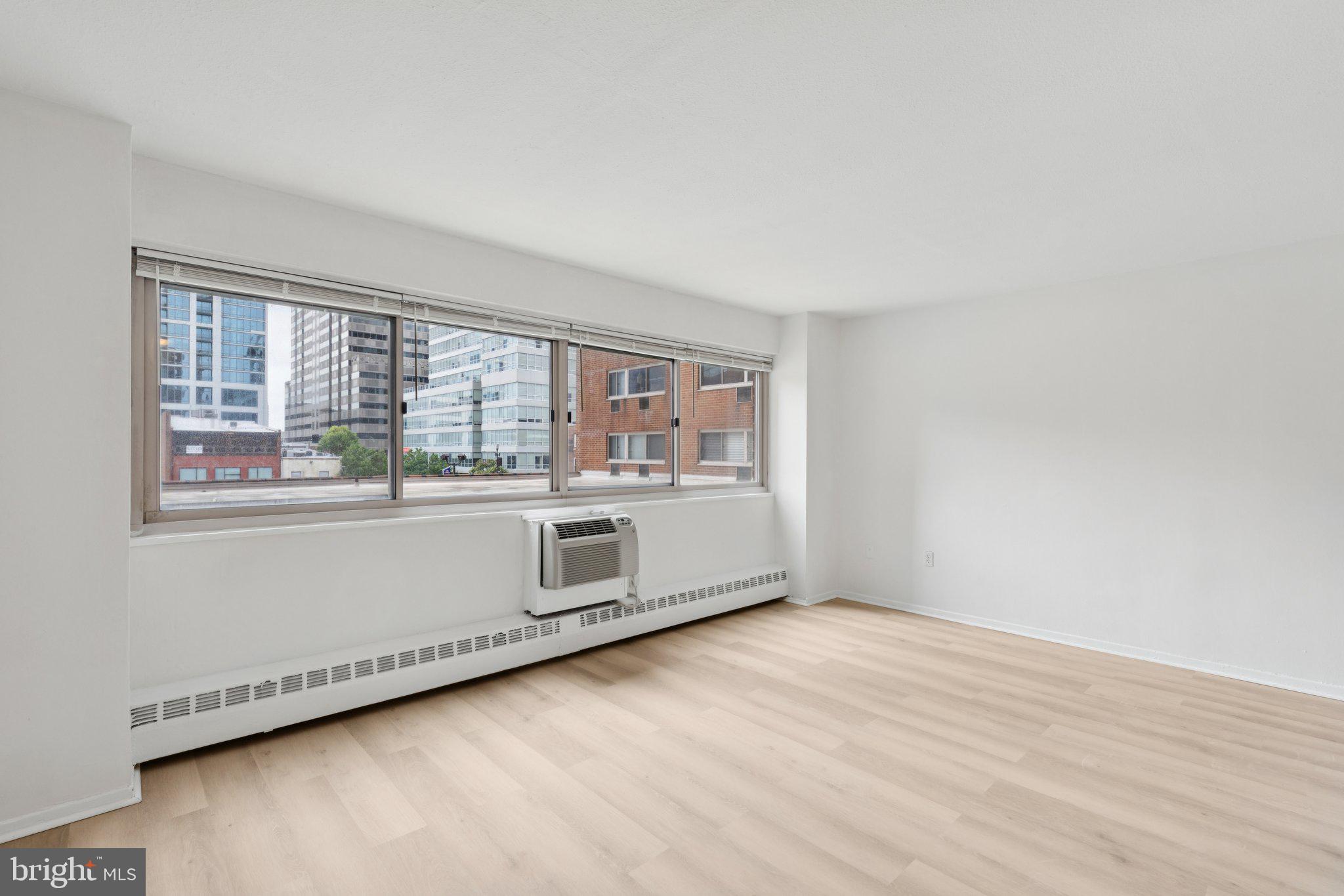 2101 Chestnut Street, Unit 324R Philadelphia, PA 19103 - Photo 3 of 21 a view of an empty room with a window