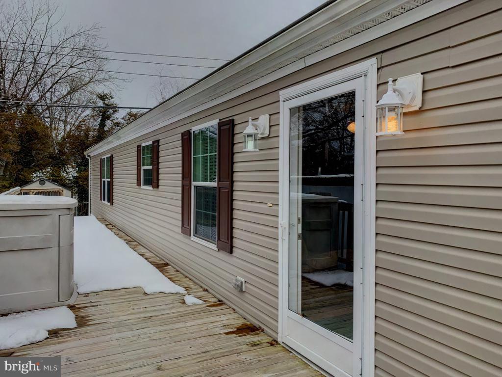 1340 Evering Avenue Rosedale, MD 21237 - Photo 1 of 34 a view of a house with a door and wooden walls