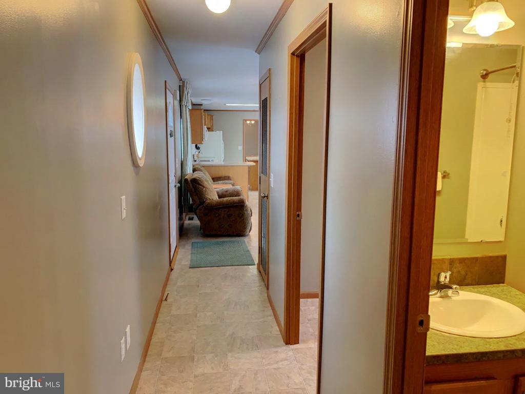 1340 Evering Avenue Rosedale, MD 21237 - Photo 23 of 34 a view of a bathroom from a corridor