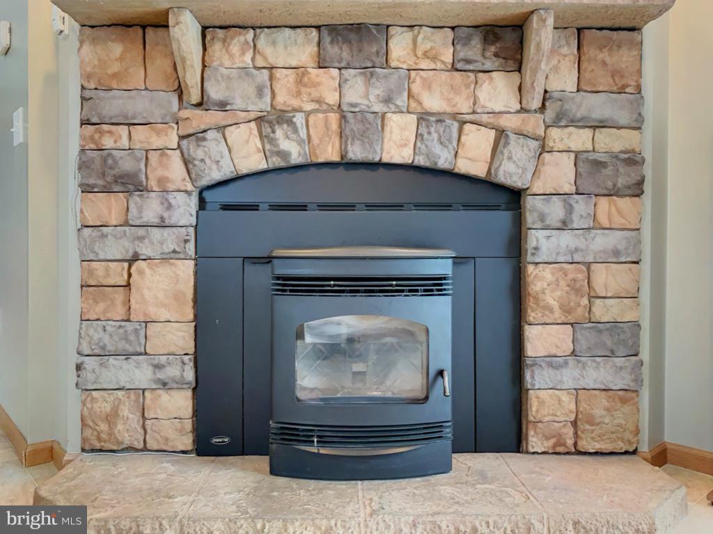 1340 Evering Avenue Rosedale, MD 21237 - Photo 6 of 34 a living room with a fireplace