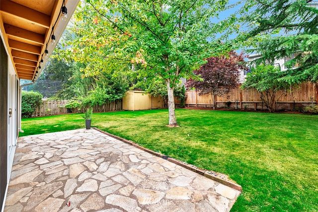 a view of a backyard with a garden