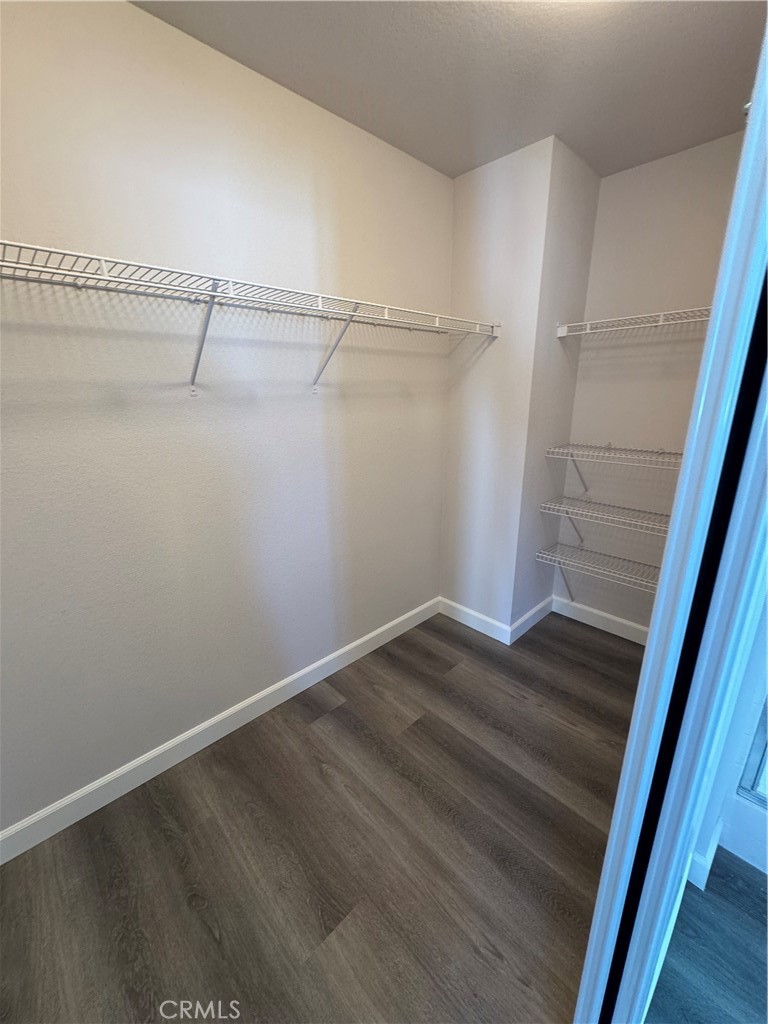 39790-39790 Monarch Drive Murrieta, CA 92563 - Photo 10 of 22 a view of a room with wooden floor