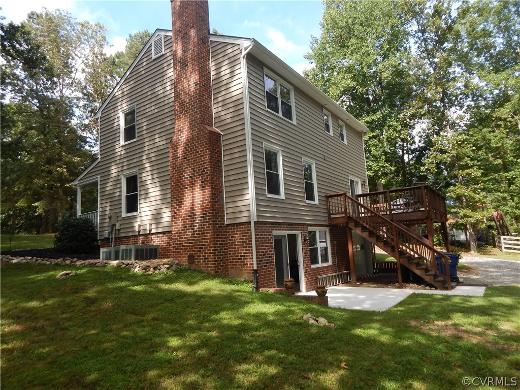 10321 Robbie Road Chesterfield, VA 23832 - Photo 3 of 20 a view of house with a backyard