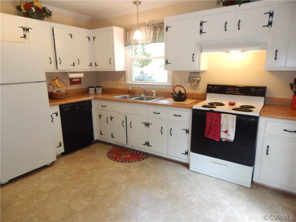 10321 Robbie Road Chesterfield, VA 23832 - Photo 8 of 20 a kitchen with stainless steel appliances granite countertop a stove a sink and a refrigerator