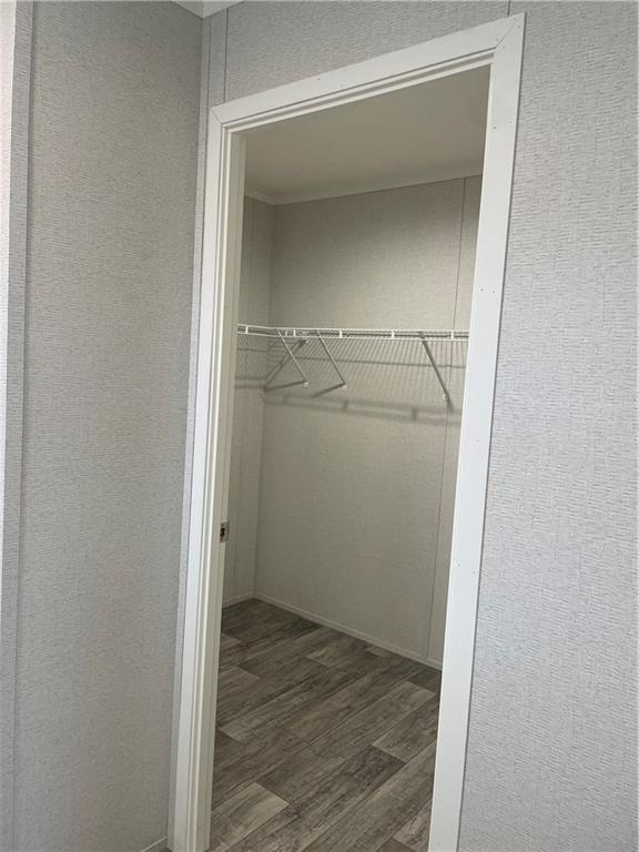 1322 Hidden Valley Road Bulger, PA 15019 - Photo 12 of 14 an empty room with wooden floor and mirror