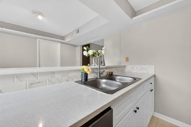 a kitchen with a stove and a microwave