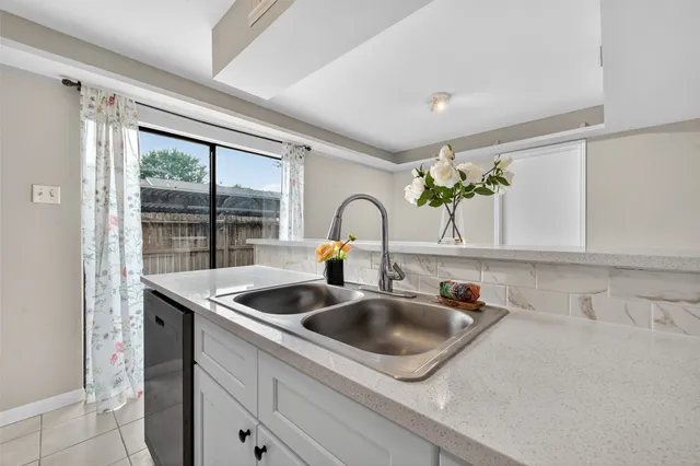 a bathroom with a sink and a stove