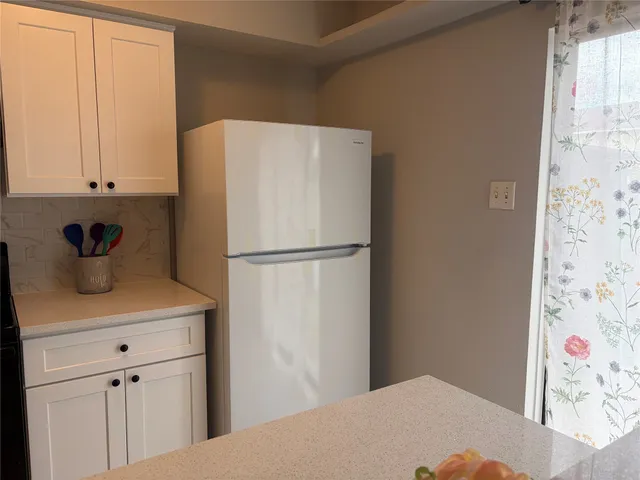 a bathroom with a sink and a stove