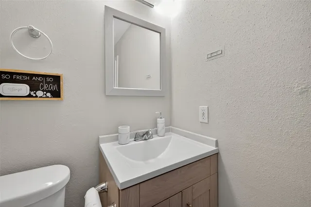 a front view of a house with large windows