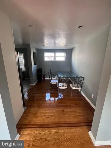 a view of a living room and dining room