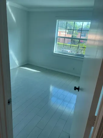 an empty room with a window