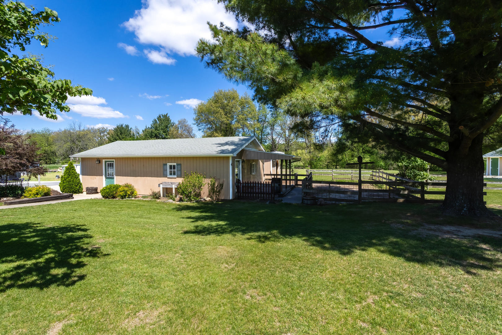2660 252nd Street De Witt, IA 52742 - Photo 7 of 45 a view of a house with a yard