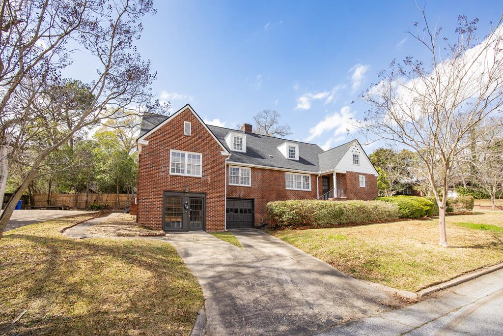 1620 Springer Street Columbus, GA 31901 - Photo 1 of 41 a front view of a house with a yard