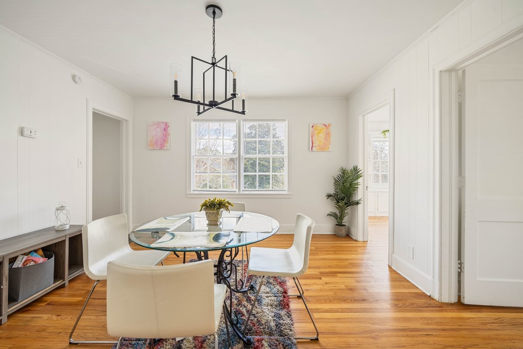 1620 Springer Street Columbus, GA 31901 - Photo 22 of 41 a view of a dining room with furniture window and wooden floor