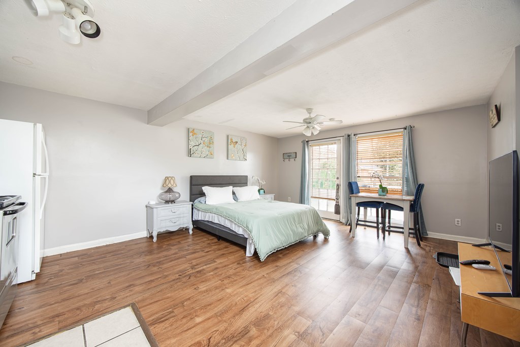 1620 Springer Street Columbus, GA 31901 - Photo 40 of 41 a spacious bedroom with a bed and a table in it